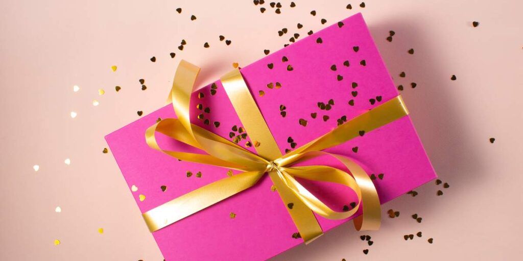 Pink Gift Box With Gold Ribbon — Florist in Birtinya, QLD
