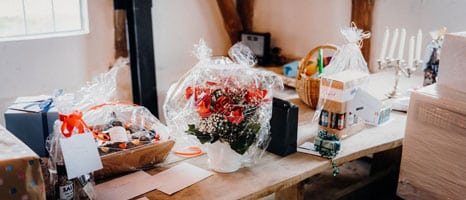Gifts-And-Hampers-On-Wooden-Table
