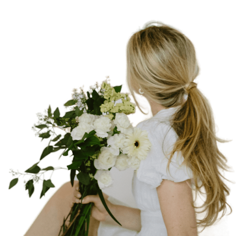 Girl-Holding-A-Bouquet-Of-White-Roses.png