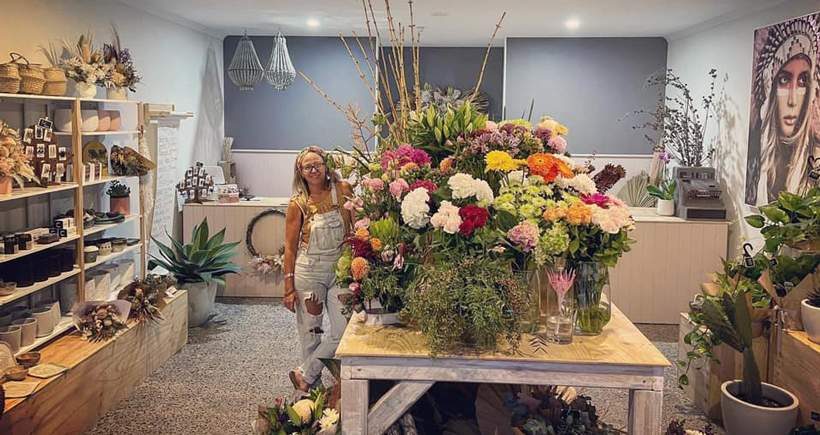 Florist Surrounded with Flowers — Florist in Birtinya, QLD